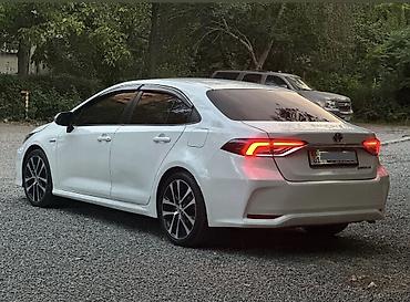 byd e6: Toyota Corolla: 2019 г., 1.8 л, Вариатор, Гибрид, Седан — 5