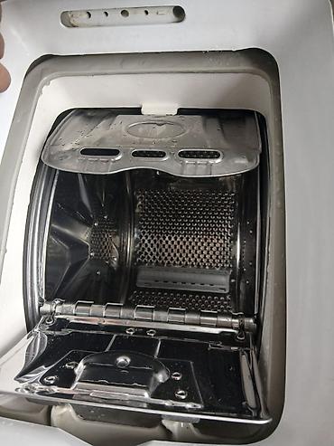 vertical: Paltaryuyan maşın Hotpoint Ariston, 6 kq, İşlənmiş, Avtomat, Qurutma var, Ünvandan götürmə — 1