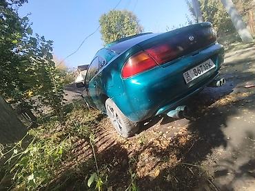 обмен на малолетражку: Mazda 323: 1996 г., 1.8 л, Механика, Бензин, Седан — 5