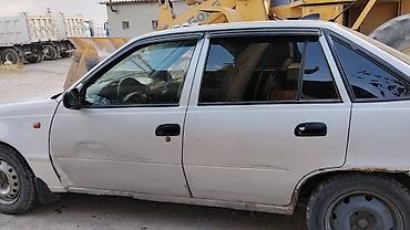 devo tiko: Daewoo Nexia: 2010 г., Механика, Седан — 4