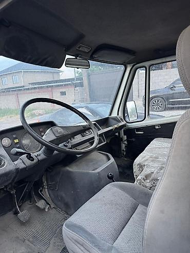т 103 купить: Грузовой бортовой автомобиль с деревянными высокими бортами. Основные — 1