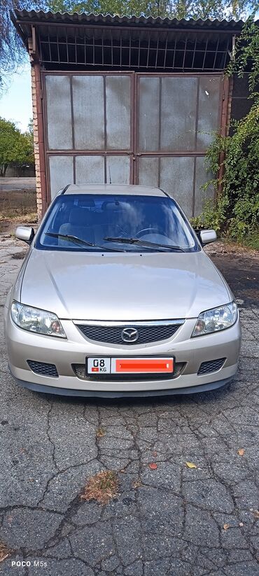 Mazda: Mazda 323: 1999 г., 1.5 л, Механика, Бензин, Хэтчбэк