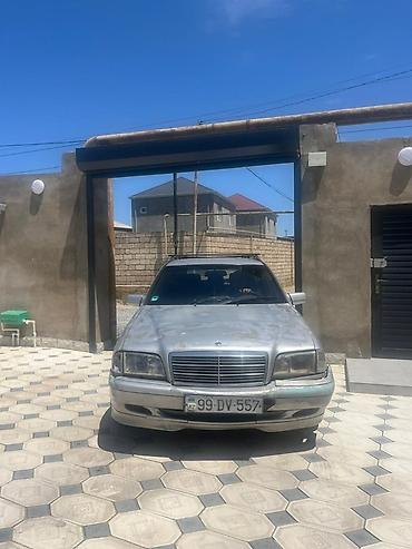 Mercedes-Benz C‑Class Universal (W202) – gümüş rəngli stansiyon vaqon