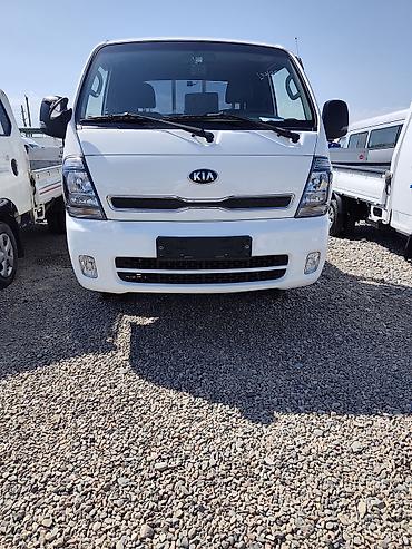 235 65 19: Kia Bongo III (K2500/K2700) бортовой малотоннажный грузовик, белый — 1