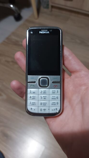 Apple iPhone: Nokia C5, Düyməli