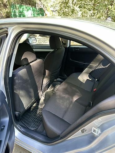 k doo: Mitsubishi Lancer: 2011 г., 1.5 л, Автомат, Бензин, Седан — 8