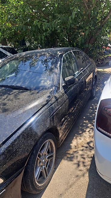 mercedes e class: BMW 5 series: 2.5 l | 1997 il Sedan — 3