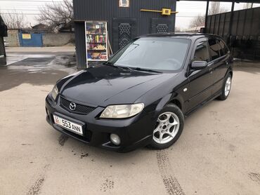 машина эстима: Mazda 323: 2002 г., 2 л, Автомат, Бензин, Универсал