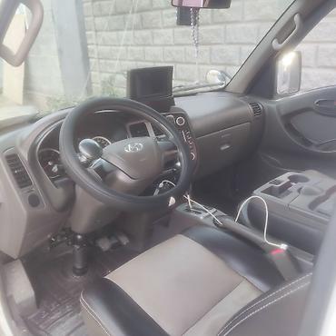 топливозаправщик купить: Hyundai Porter II — компактный городской грузовик с открытой бортовой — 4