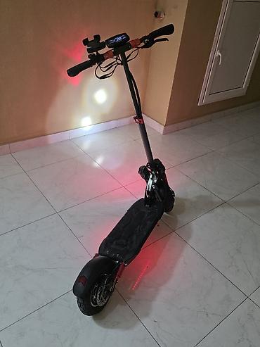 Elektrikli samokatlar: Scooter yaxsi Veziyete 1100 km surulub 35-45 km mesafe chargi catir — 3