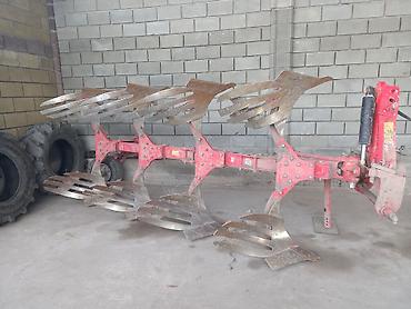 Оборотные плуги, перевертыши: Продаю два плуг на МтЗ ЮтО турецкий .UNLU 4+ перьевые отвалы цена — 2
