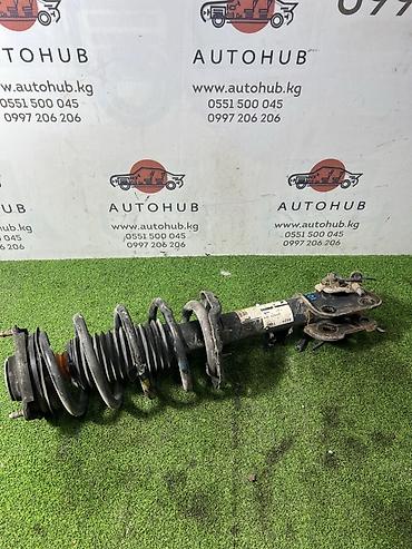 5 htp: Передний амортизатор Kia Б/у, Оригинал, Корея — 1