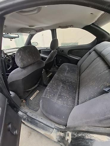 su motosikleti: Chrysler Neon: 2 l | 1997 il 203785 km Sedan — 9