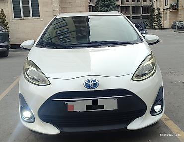 Toyota: Toyota Aqua: 2018 г., 1.5 л, Вариатор, Гибрид, Хэтчбэк — 1