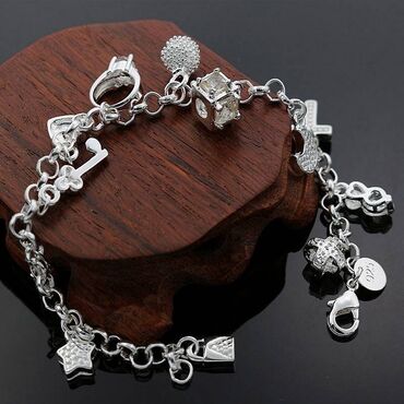 muški kožni sako: Charm bracelet, Material: Silver