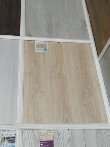 suya davamlı laminat: Məhsul: Laminat döşəmə panelləri Təsvir: - Müxtəlif ağac teksturalı