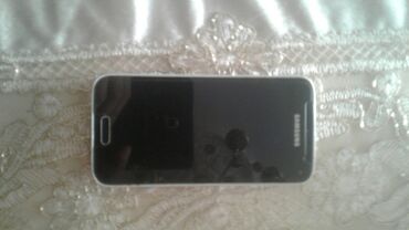 Samsung Galaxy S5 Duos, 16 ГБ, цвет - Черный, Кнопочный, Отпечаток пальца