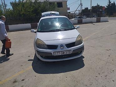 Renault: Renault Scenic, ağ rəng, 5 qapılı kompakt minivan. Xüsusiyyətlər: - — 1