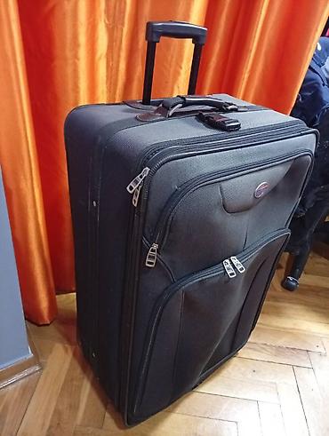 Putni koferi i torbe: Veliki kofer na točkiće – American Tourister. 75 45 30 - — 1
