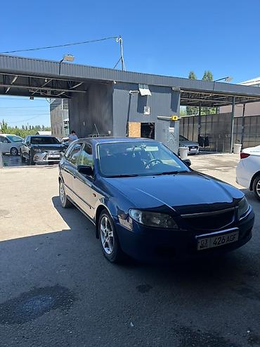 mazda mx5: Mazda 323: 2002 г., 1.6 л, Механика, Бензин, Хэтчбэк — 9