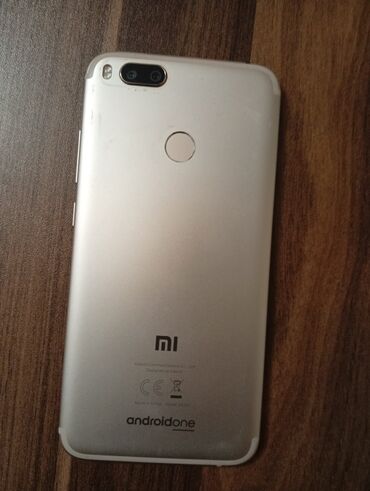 телефоны флай iq4403: Xiaomi Mi A1, 64 ГБ, цвет - Золотой, 
 Две SIM карты