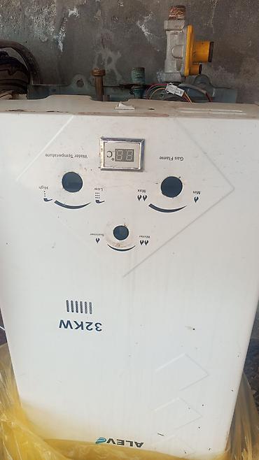 elektrik su qızdırıcı: Alev markalı qazla işləyən su qızdırıcısı (geyzer) - Güc: 32 kW — 2