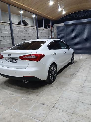 авто фольксваген: Kia Cerato: 1.6 л | Седан — 4