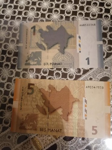 2005 ci ilə aid 1 və 5 azn tam UNC dovruyyede olmuyan