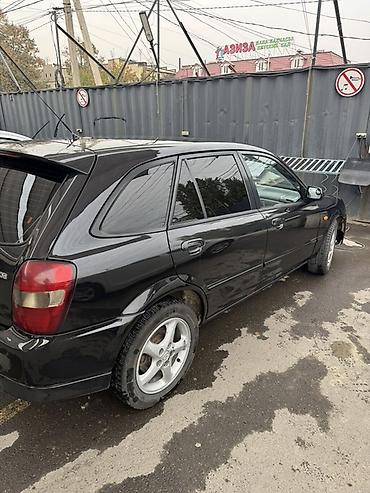 maxda demio: Mazda 323: 2001 г., Механика, Бензин, Хэтчбэк — 6