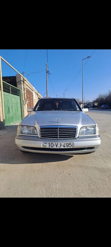 Mercedes-Benz: Mercedes-Benz 220: 2.2 l | 1996 il Sedan