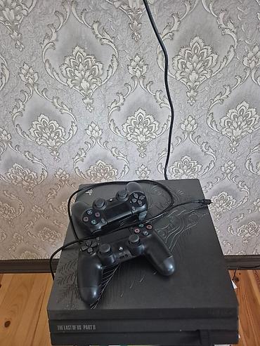 PS4 (Sony PlayStation 4): PlayStation 4 Pro 1TB – The Last of Us Part II Limited Edition Satılır — 1