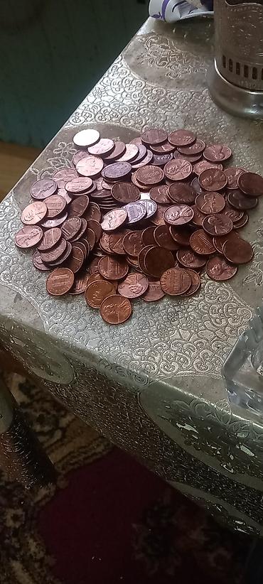 Sikkələr: 150 ədəd ABŞ 1 senti - ABŞ-da, əmək haqqının yüksək olması və kard — 2