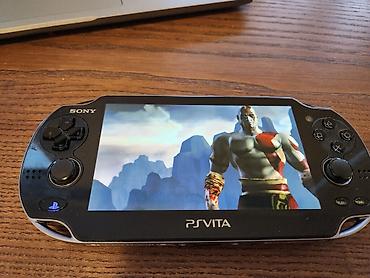 ps vita oyun konsolu: Ps vita qara qirilip istenilen oyun yuklene biler — 4