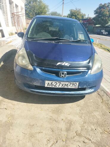 автомобиль фит: Honda Fit (первое поколение), 5‑дверный хэтчбек, синий цвет кузова