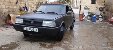 Tofas: Tofaş Şahin sedan – qara rəng, 4 qapı, arxa ötürücülü. Xüsusiyyətlər — 8