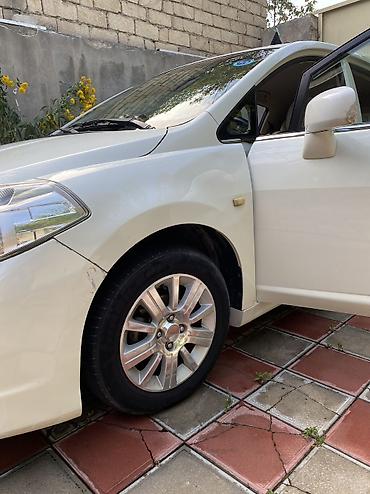 nissan tiida: Nissan Tiida: 1.5 l | 2011 il Hetçbek — 8