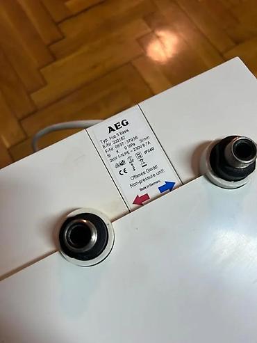 Ostale sanitarije: AEG protočni električni bojler – model Huz 5 Basis (E-Nr. 222167) - — 1