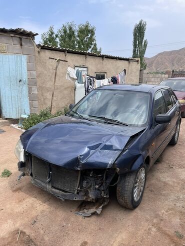 скупка авто в любом состоянии: Автомобиль Mazda 323F, синего цвета, аварийный на ходу подробности по