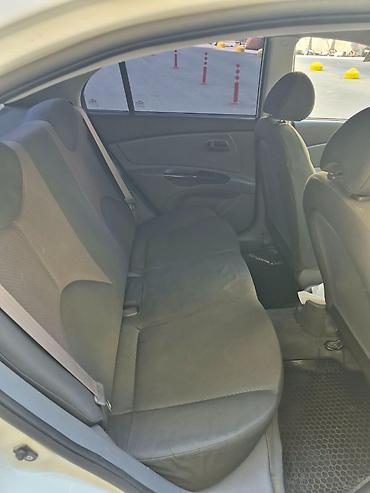 chery maşın: Kia Rio: 1.6 l | 2011 il Sedan — 8