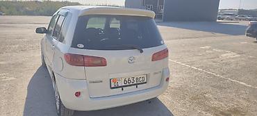 кредит на машину: Mazda Demio: 2004 г. — 7