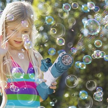 oyuncag at: DODOING Bubble Machine, 10 Delikli Bubble Gun Uşaqlar üçün Bubble