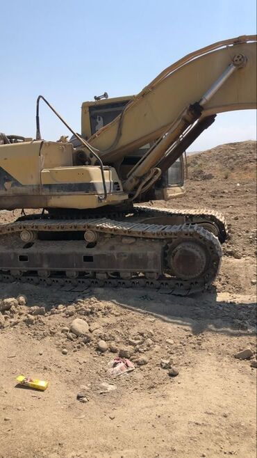 испаритель на чарон: Экскаватор, Caterpillar, Гусеничный