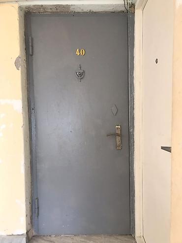 qapi celengi: Bina evindən çıxarılmış köhnə metal çöl qapısı satılır. Ölçü: 90×200 — 1