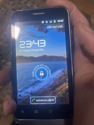 телефон fly m100: ZTE v889m, < 2 ГБ, цвет - Черный, Сенсорный, Беспроводная зарядка