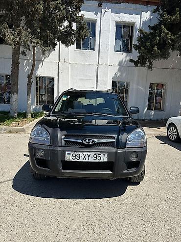 reduktor motor: Hyundai Tucson: 2 l | 2009 il Ofrouder/SUV — 1