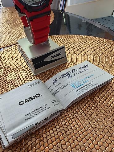 saat still: CASIO qol saatı – rəqəmsal, idman üslubunda Model: AE-1000 seriyası — 2