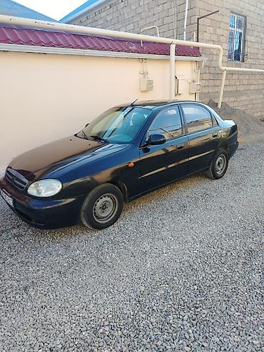 Daewoo: Daewoo Nexia: 1.3 l | 2010 il Sedan — 11