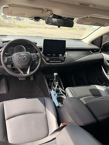 тайота литайс: Toyota Corolla: 2022 г., 1.8 л, Автомат, Гибрид, Седан — 9