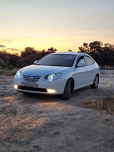 92: Hyundai Elantra: 2 l | 2009 il Sedan — 1