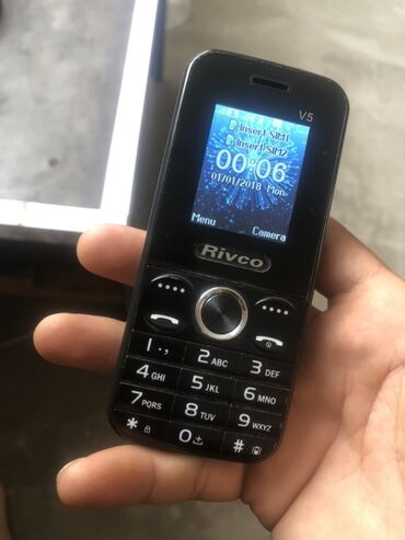 duyu bişirən: Sadə mobil telefon olaraq istifadə olunan, Rivco markalı qara rəngli